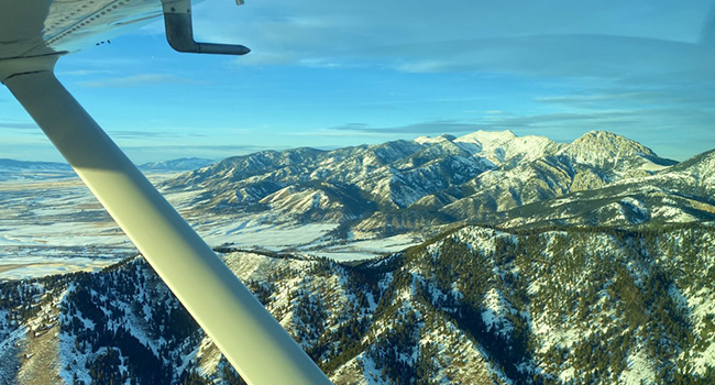 Winter Airplane Flight Snow On The Mountains