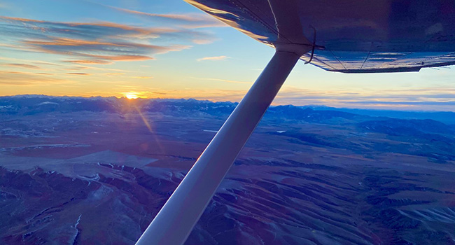 Winter Airplane Flight Sunset View